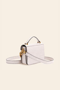 RETOUR MINI HANDLE FLAP BAG